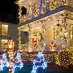 House and lawn decorated in christmas lights and decoration